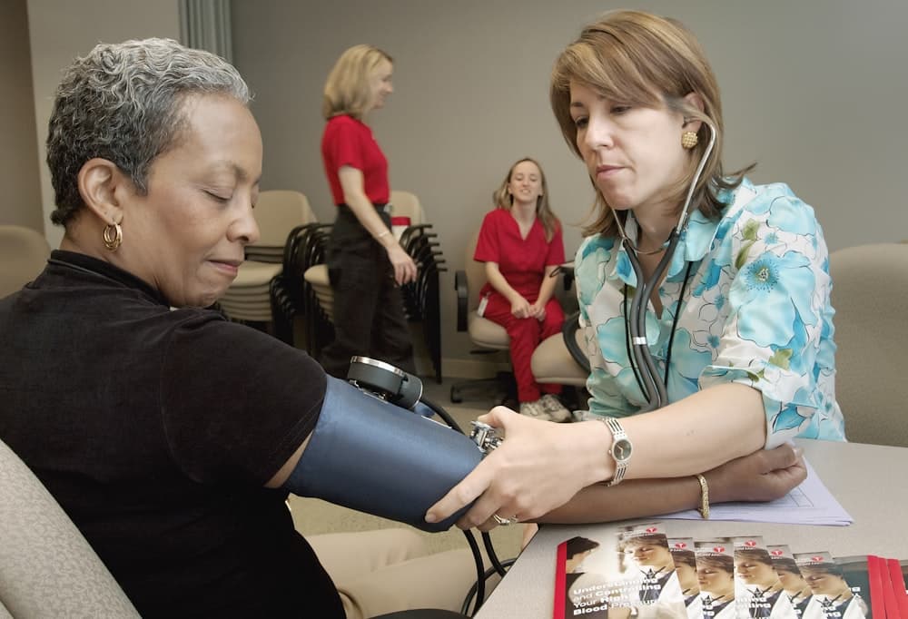 Compassionate care - healthcare worker assisting a patient